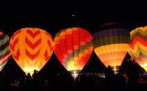Image of hot air balloons at night